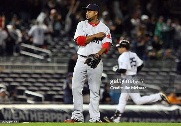 Ramon Ramirez of the Boston Red Sox looks on after surrendering a home run to Mark Teixeira of the New York Yankees on May 4, 2009 at Yankee Stadium...
