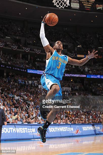 Chris Paul of the New Orleans Hornets takes the ball to the basket against the Denver Nuggets in Game Five of the Western Conference Quarterfinals...
