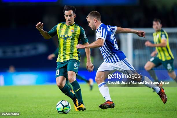 Jose Manuel Jurado RCD Espanyol duels for the ball with Kevin Rodrigues of Real Sociedad during the La Liga match between Real Sociedad de Futbol and...