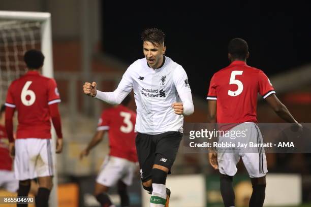 Marko Grujic of Liverpool celebrates after scoring a goal to make it 1-2 during the Premier League 2 fixture between Manchester United and Liverpool...