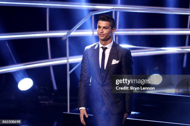 Cristiano Ronaldo leaves the stage after being named in The Fifa FifPro World XI during The Best FIFA Football Awards Show on October 23, 2017 in...