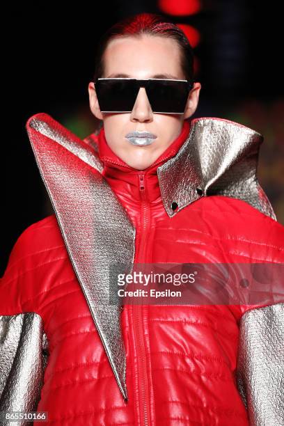 Model walks the runway at the Slava Zaitsev's Fashion Laboratory fashion show during day three of Mercedes Benz Fashion Week Russia S/S 2018 at...