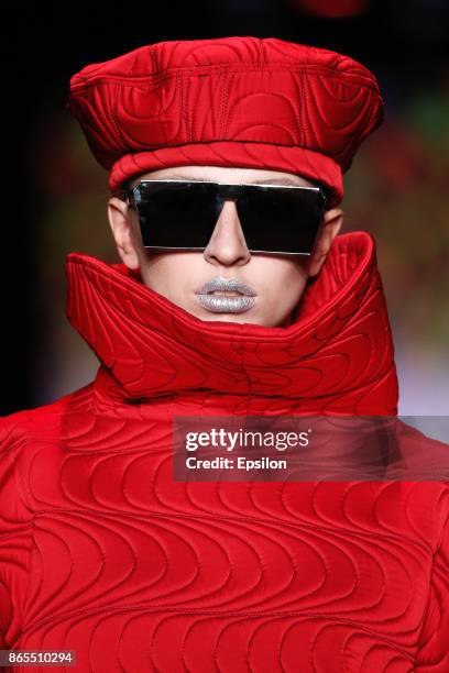 Model walks the runway at the Slava Zaitsev's Fashion Laboratory fashion show during day three of Mercedes Benz Fashion Week Russia S/S 2018 at...