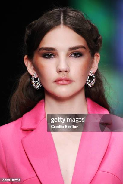 Model walks the runway at the Dasha Gauzer fashion show during day three of Mercedes Benz Fashion Week Russia S/S 2018 at Manege on October 23, 2017...