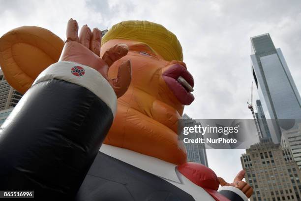 Pop-up inflatable 'Trump Rat' is erected facing the Frank Rizzo statue, in Center City Philadelphia, PA, on Rizzos birthday, October 23, 2017. In...