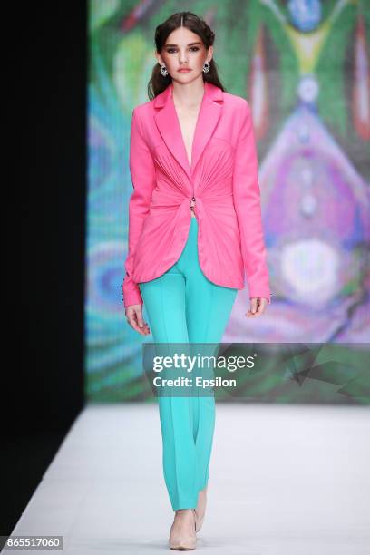 Model walks the runway at the Dasha Gauzer fashion show during day three of Mercedes Benz Fashion Week Russia S/S 2018 at Manege on October 23, 2017...