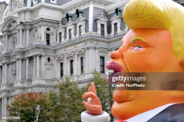 Pop-up inflatable 'Trump Rat' is erected facing the Frank Rizzo statue, in Center City Philadelphia, PA, on Rizzos birthday, October 23, 2017. In...