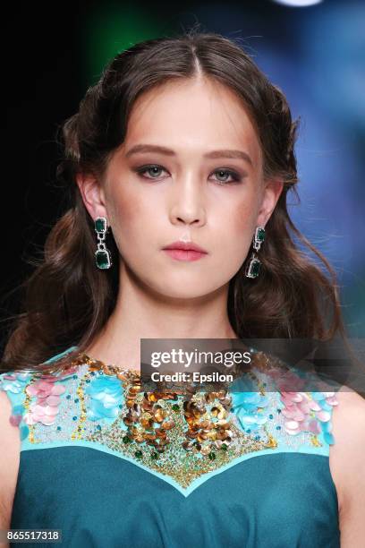 Model walks the runway at the Dasha Gauzer fashion show during day three of Mercedes Benz Fashion Week Russia S/S 2018 at Manege on October 23, 2017...