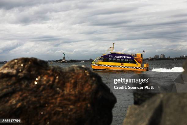 Water taxi leaves Red Hook, Brooklyn on October 23, 2017 in New York City. Red Hook, like many coastal neighborhoods in New York, was severely...