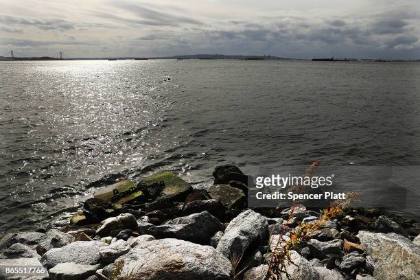 The Red Hook neighborhood in Brooklyn ends at New York Harbor on October 23, 2017 in New York City. Red Hook, like many coastal neighborhoods in New...