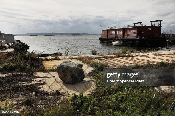 The Red Hook neighborhood in Brooklyn ends at New York Harbor on October 23, 2017 in New York City. Red Hook, like many coastal neighborhoods in New...