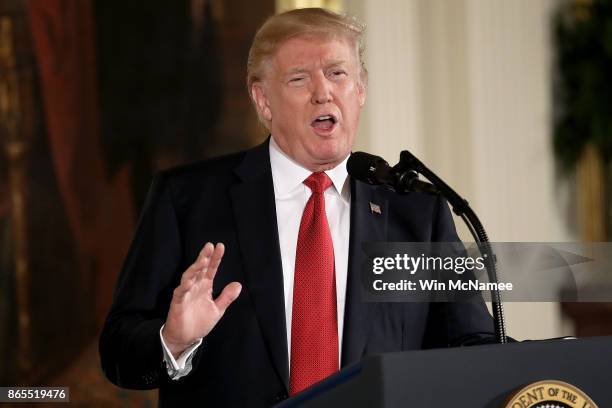 President Donald Trump speaks at a ceremony awarding U.S. Army Capt. Gary Rose, of Huntsville, Alabama, with the Medal of Honor during a ceremony in...