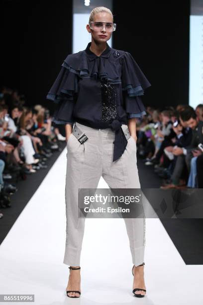 Model walks the runway at the Julia Dalakian fashion show during day three of Mercedes Benz Fashion Week Russia S/S 2018 at Manege on October 23,...