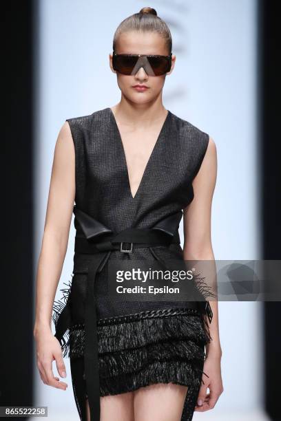 Model walks the runway at the Julia Dalakian fashion show during day three of Mercedes Benz Fashion Week Russia S/S 2018 at Manege on October 23,...