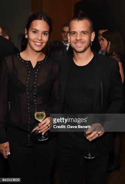 Cristina Pedroche and David Munoz attend 10th anniversary of Alain Ducasse at The Dorchester on October 23, 2017 in London, England.