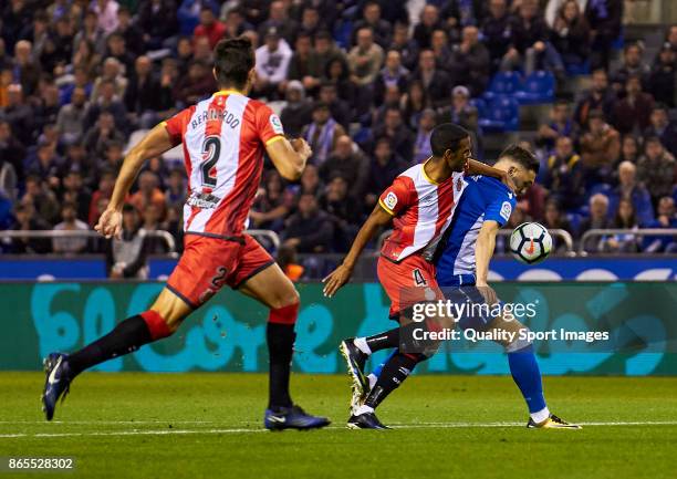 Jonas Ramalho of Girona FC makes a penalty to Lucas Perez of Deportivo de La Coruna during the La Liga match between Deportivo La Coruna and Girona...