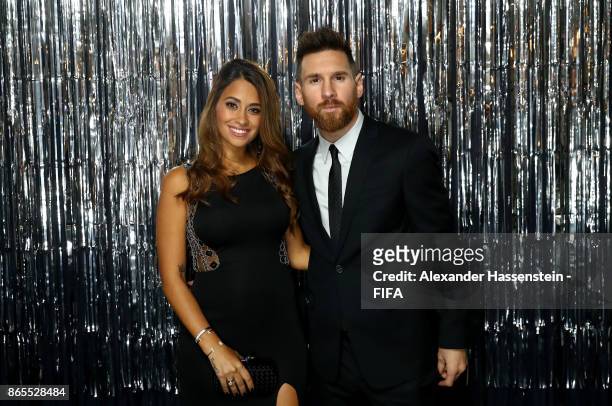 Lionel Messi and his wife Antonella Roccuzzo is pictured inside the photo booth prior to The Best FIFA Football Awards at The London Palladium on...