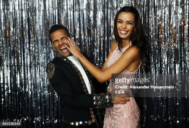 Dani Alves and his wife Joana Sanz is pictured inside the photo booth prior to The Best FIFA Football Awards at The London Palladium on October 23,...