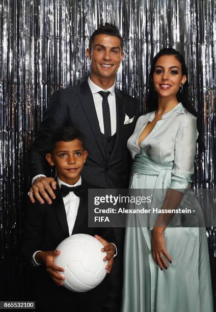 Cristiano Ronaldo, his girlfriend, Georgina Rodríguez and his son Cristiano Ronaldo Jr are pictured inside the photo booth prior to The Best FIFA...