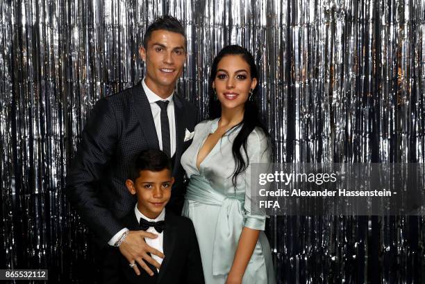 Cristiano Ronaldo, his girlfriend, Georgina Rodríguez and his son Cristiano Ronaldo Jr are pictured inside the photo booth prior to The Best FIFA...