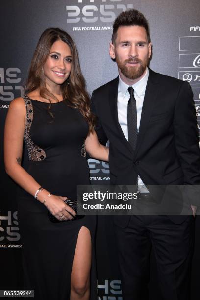 Barcelona's forward Lionel Messi and his wife Antonella Roccuzzo arrive for the The Best FIFA 2017 Awards at the Palladium Theatre in London, England...