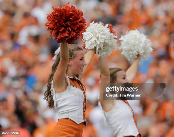 Texas Longhorns cheerleaders perform during the game against the Oklahoma State Cowboys at Darrell K Royal-Texas Memorial Stadium on October 21, 2017...