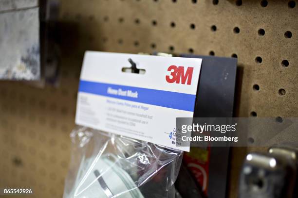 The 3M Co. Logo is seen on a package of dust masks in this arranged photograph taken in Tiskilwa, Illinois, U.S., on Monday, Oct. 23, 2017. 3M is...