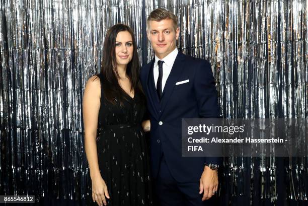 Toni Kroos and his wife Jessica Farber are pictured inside the photo booth prior to The Best FIFA Football Awards at The London Palladium on October...