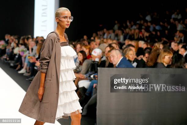 Model presents a creation by Russian designer Julia Dalakian during the Mercedes-Benz Fashion Week in Moscow, Russia on October 23, 2017.