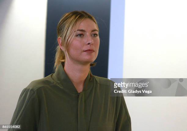 Maria Sharapova attends a press conference during her visit to bring aid for hurricane relief at Luis Munoz Marin International Airport on October...