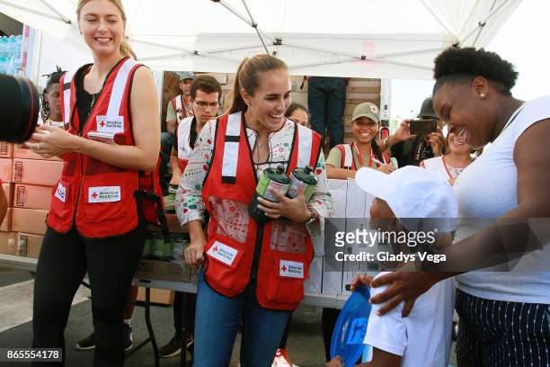 Maria Sharapova and Monica Puig deliver aid to Hurricane Maria victims at Centro Tau on October 23, 2017 Loiza, Puerto Rico.