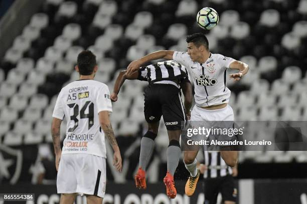Marcos Vinicius of Botafogo battles for the ball with Balbuena of Corinthians during the match between Botafogo and Corinthians as part of...