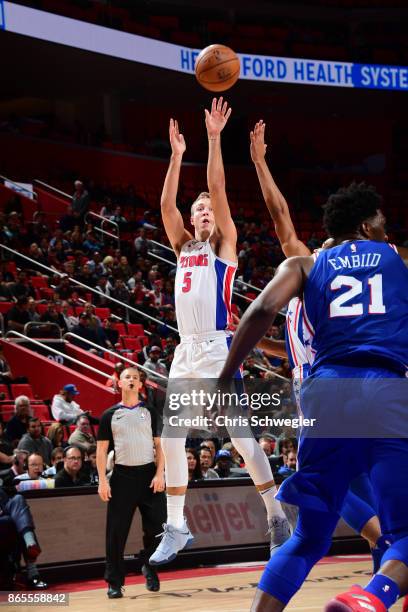 Luke Kennard of the Detroit Pistons shoots the ball against the Philadelphia 76ers on October 23, 2017 at Little Caesars Arena in Detroit, Michigan....