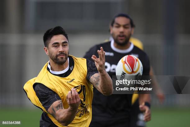 Shaun Johnson of the Kiwis passes during a New Zealand Kiwis Rugby League World Cup Training Session at the Warriors training Grounds on October 24,...