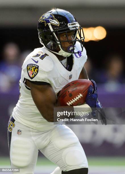 Bobby Rainey of the Baltimore Ravens returns a kick against the Minnesota Vikings during the game on October 22, 2017 at US Bank Stadium in...