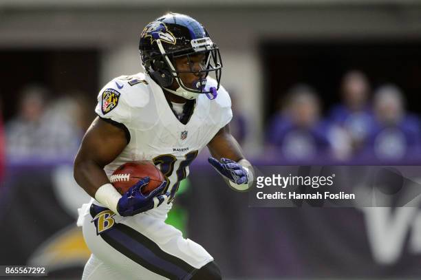 Bobby Rainey of the Baltimore Ravens returns a kick against the Minnesota Vikings during the game on October 22, 2017 at US Bank Stadium in...