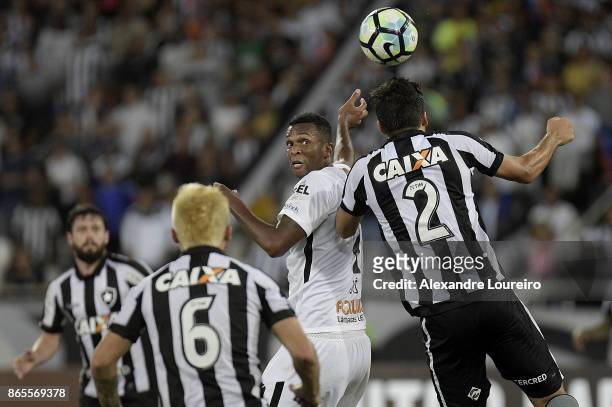Igor Rabello of Botafogo battles for the ball with Jo of Corinthians during the match between Botafogo and Corinthians as part of Brasileirao Series...
