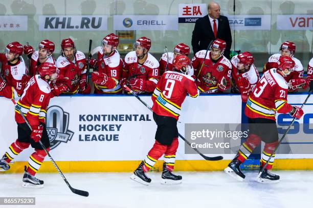 Blacker Jesse of HC Kunlun Red Star celebrates a goal with team mates against Admiral Vladivostok in their 2017/18 KHL Regular Season ice hockey...