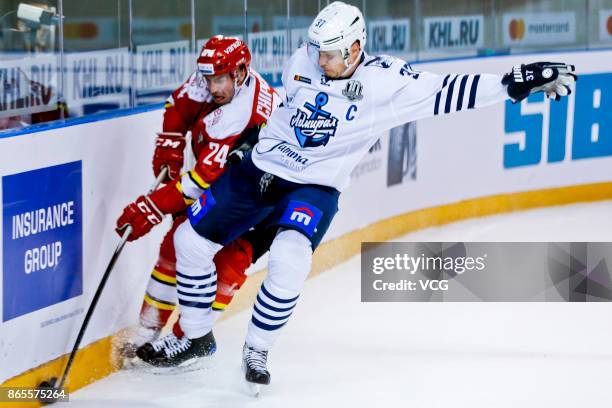 Chipchura Kyle of HC Kunlun Red Star and Bartulis Oskars of Admiral Vladivostok compete in their 2017/18 KHL Regular Season ice hockey match at...