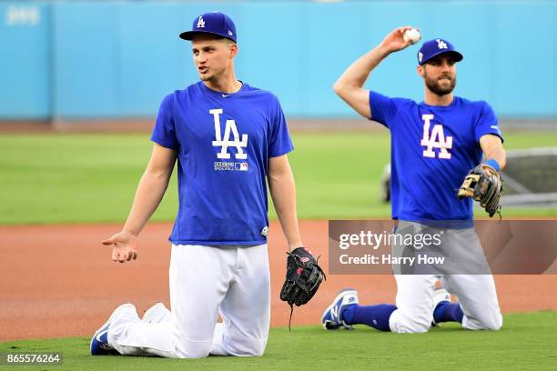 Corey Seager and Chris Taylor of the Los Angeles Dodgers on the field ahead of the World Series at Dodger Stadium on October 23, 2017 in Los Angeles,...