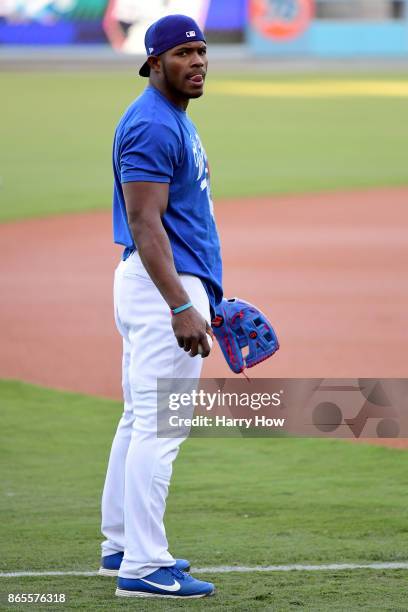 Yasiel Puig of the Los Angeles Dodgers sticks out his tongue on the field ahead of the World Series at Dodger Stadium on October 23, 2017 in Los...