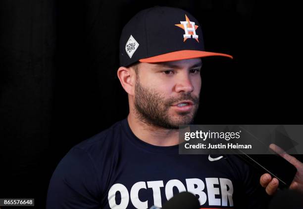 Jose Altuve of the Houston Astros answers questions from the media ahead of the World Series at Dodger Stadium on October 23, 2017 in Los Angeles,...