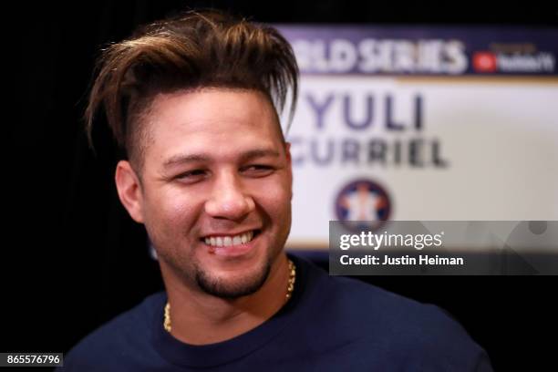 Yuli Gurriel of the Houston Astros answers questions from the media ahead of the World Series at Dodger Stadium on October 23, 2017 in Los Angeles,...