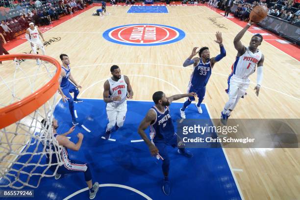 Reggie Jackson of the Detroit Pistons shoots against the Philadelphia 76ers on October 23, 2017 at Little Caesars Arena in Detroit, Michigan. NOTE TO...
