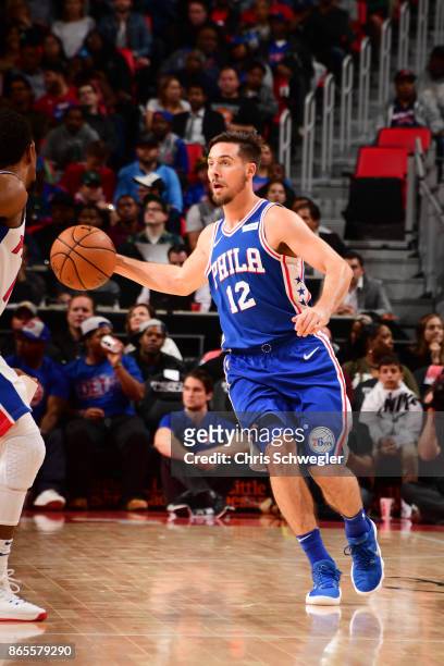 McConnell of the Philadelphia 76ers drives against the Detroit Pistons on October 23, 2017 at Little Caesars Arena in Detroit, Michigan. NOTE TO...