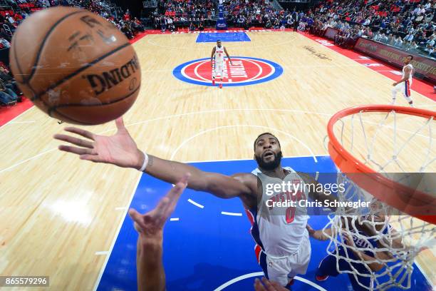 Andre Drummond of the Detroit Pistons rebounds against the Philadelphia 76ers on October 23, 2017 at Little Caesars Arena in Detroit, Michigan. NOTE...