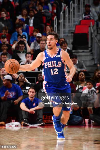 McConnell of the Philadelphia 76ers drives against the Detroit Pistons on October 23, 2017 at Little Caesars Arena in Detroit, Michigan. NOTE TO...