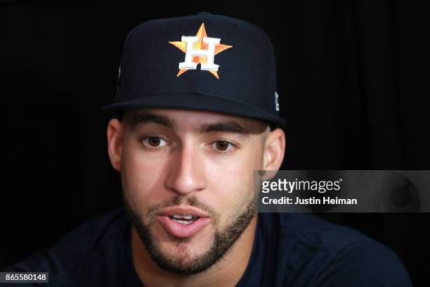 George Springer of the Houston Astros answers questions from the media ahead of the World Series at Dodger Stadium on October 23, 2017 in Los...