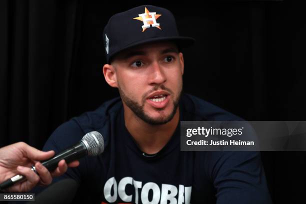 George Springer of the Houston Astros answers questions from the media ahead of the World Series at Dodger Stadium on October 23, 2017 in Los...