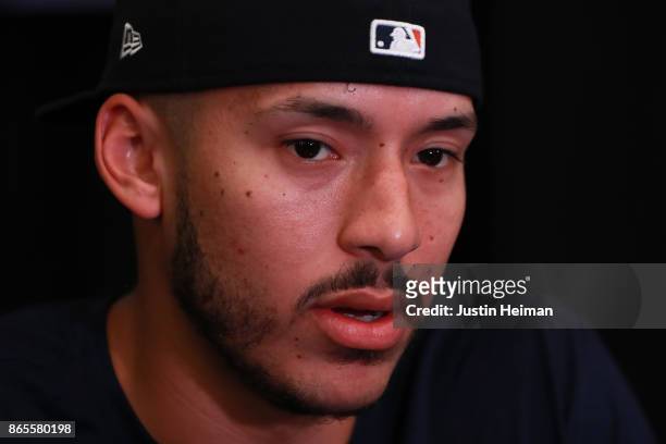 Carlos Correa of the Houston Astros answers questions from the media ahead of the World Series at Dodger Stadium on October 23, 2017 in Los Angeles,...